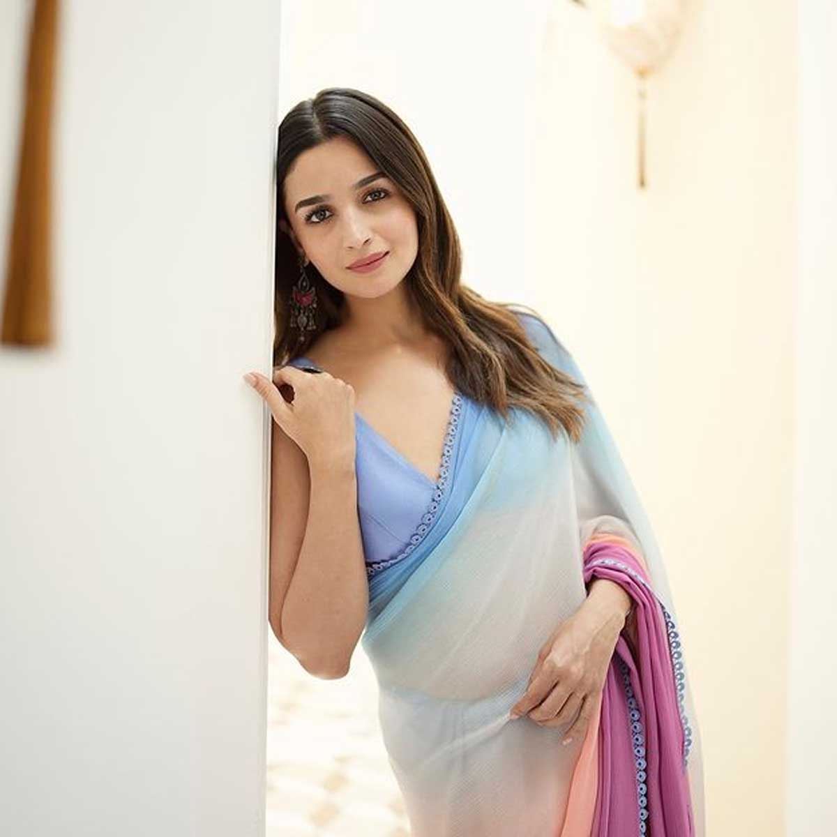 You can also style this blouse design styled by Alia Bhatt with a saree