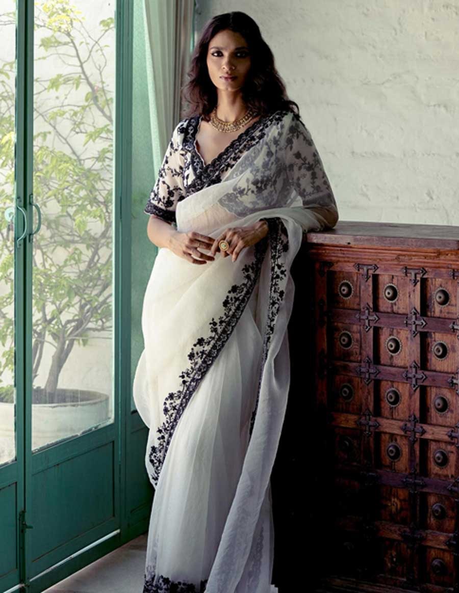 Wear this heavy designed blouse with a simple saree, look gorgeous