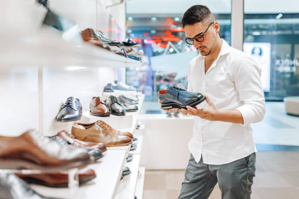 1,500+ Man Buying Shoes At A Shopping Mall Stock Photos, Pictures &  Royalty-Free Images - iStock